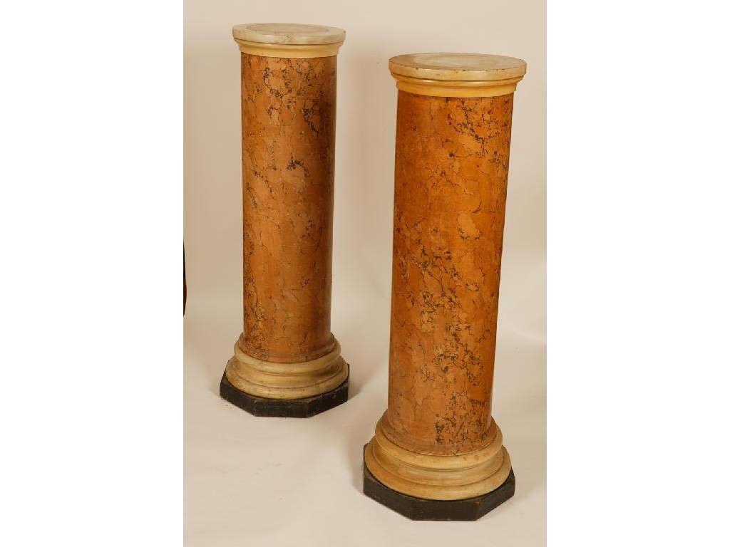 Appraisal: A PAIR OF SCAGLIOLA COLUMNS with white marble tops and