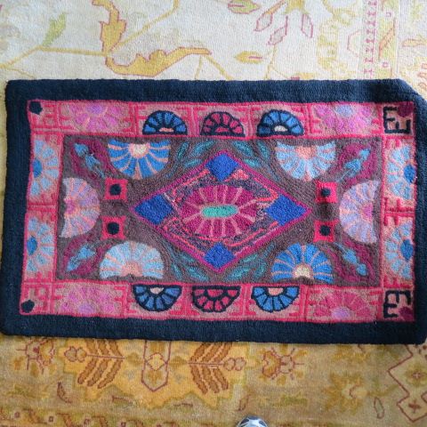 Appraisal: Antique Hooked Rug pannelled Sun Rise variation X