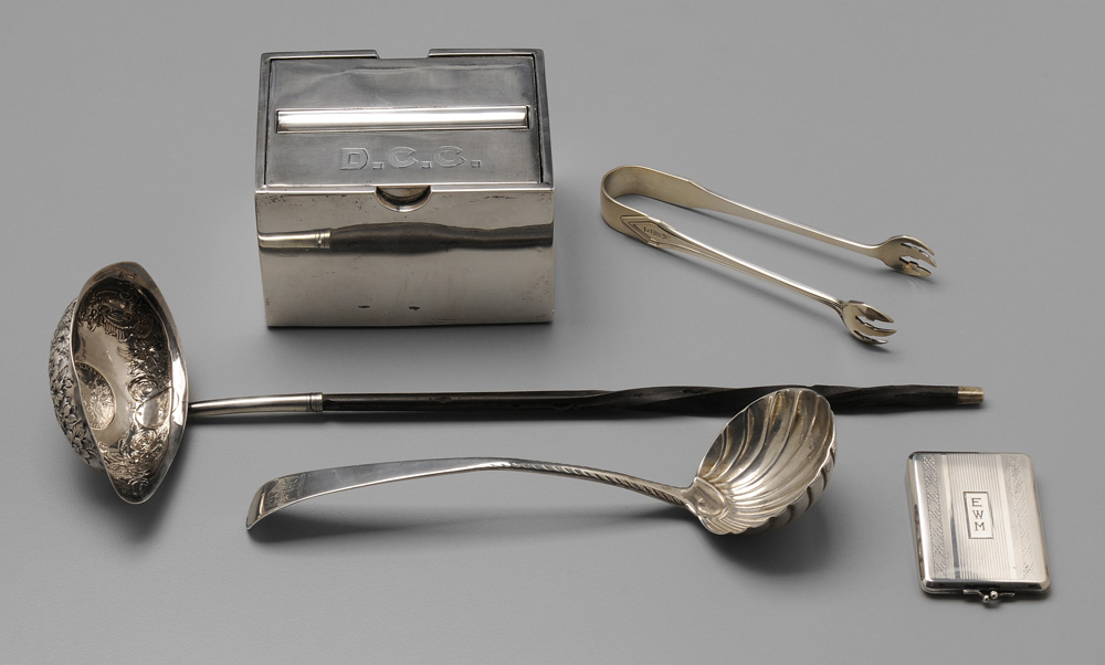 Appraisal: Assorted Silver Accessories Georgian English silver ladle English silver toddy