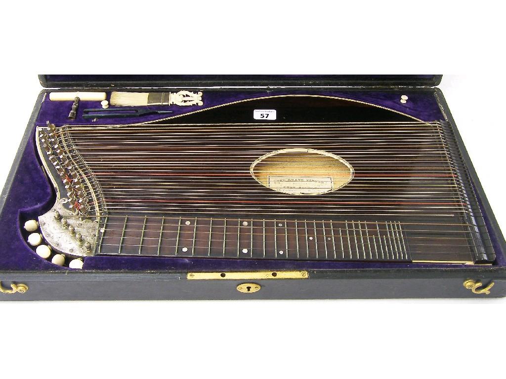 Appraisal: Early th century rosewood zither labelled The Grand Zither Designed