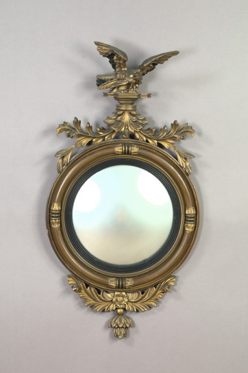 Appraisal: American Centennial Carved Parcel-Bronzed and -Ebonized Giltwood Convex Looking Glass