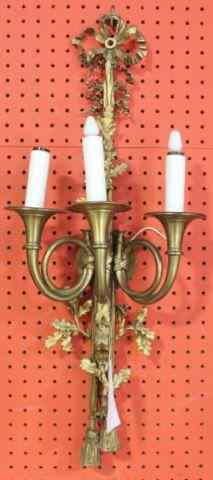 Appraisal: Pair of Bronze Arm Sconces with Tassel Bases From a