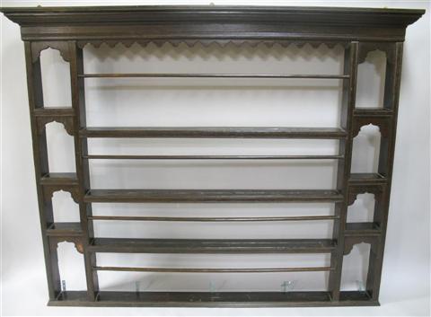 Appraisal: WELSH STYLE OAK HANGING PLATE RACK the molded cornice over