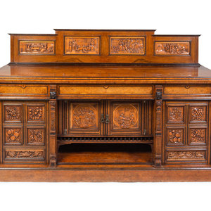 Appraisal: A Continental Carved Walnut and Burlwood Serving Cabinet Late th