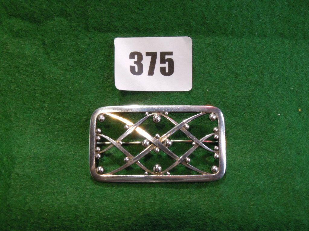 Appraisal: A Georg Jenson silver rectangular open brooch with applied balls