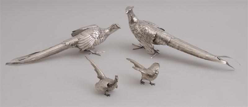 Appraisal: TWO PAIRS OF CONTINENTAL SILVER PHEASANTS The larger stamped with