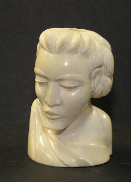 Appraisal: An African carved ivory bust age cracks height in