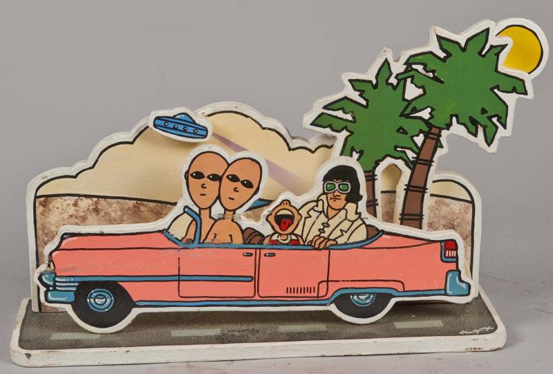 Appraisal: Elvis Pink Cadillac Aliens Desert Scene Cutout This unique folk