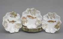 Appraisal: Limoges Fish Plates Lot includes seven porcelain plates with transfer