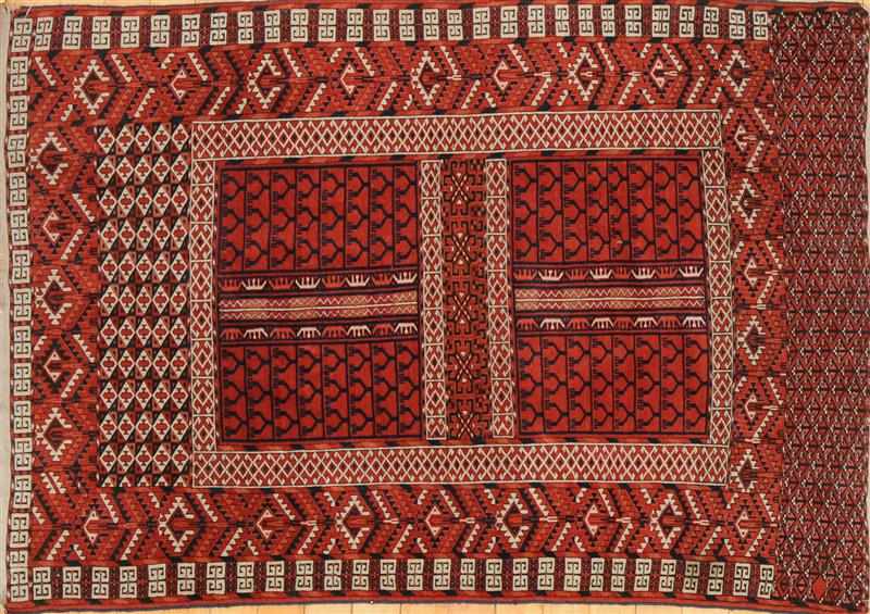 Appraisal: HATCHLI WINE RED-GROUND RUG AND TWO TEKKE RUGS The one