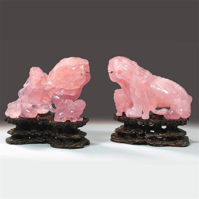 Appraisal: A pair of Chinese rose quartz carvings of Buddhist lion