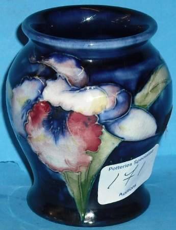 Appraisal: Moorcroft small Vase decorated in the Orchid design height cm