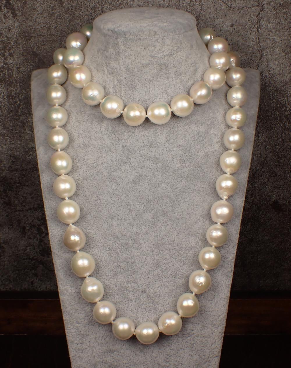 Appraisal: OPERA LENGTH LARGE WHITE FRESHWATER PEARL NECKLACE - hand-knotted strand