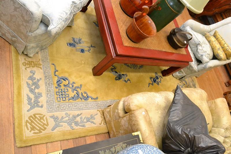 Appraisal: A CHINESE STYLE RUG IN YELLOW TONES CREAM GROUND A