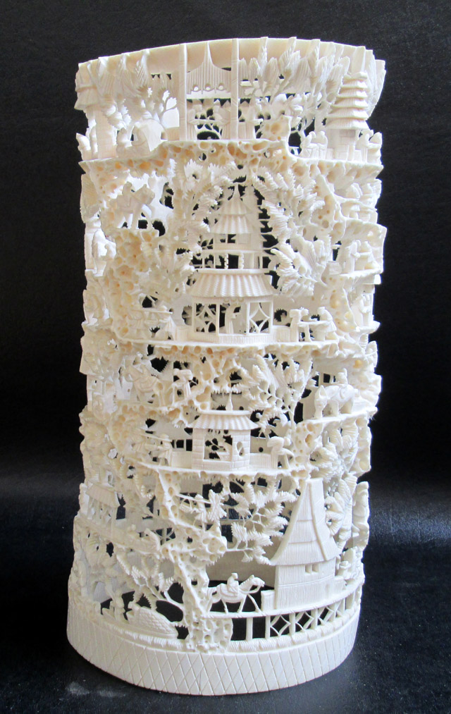 Appraisal: CHINESE CARVED IVORY TOWER with open top made from an