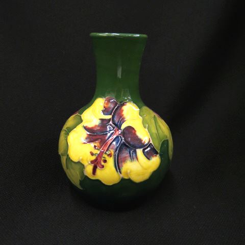 Appraisal: Moorcroft Art Pottery Vase floral on green signed excellent