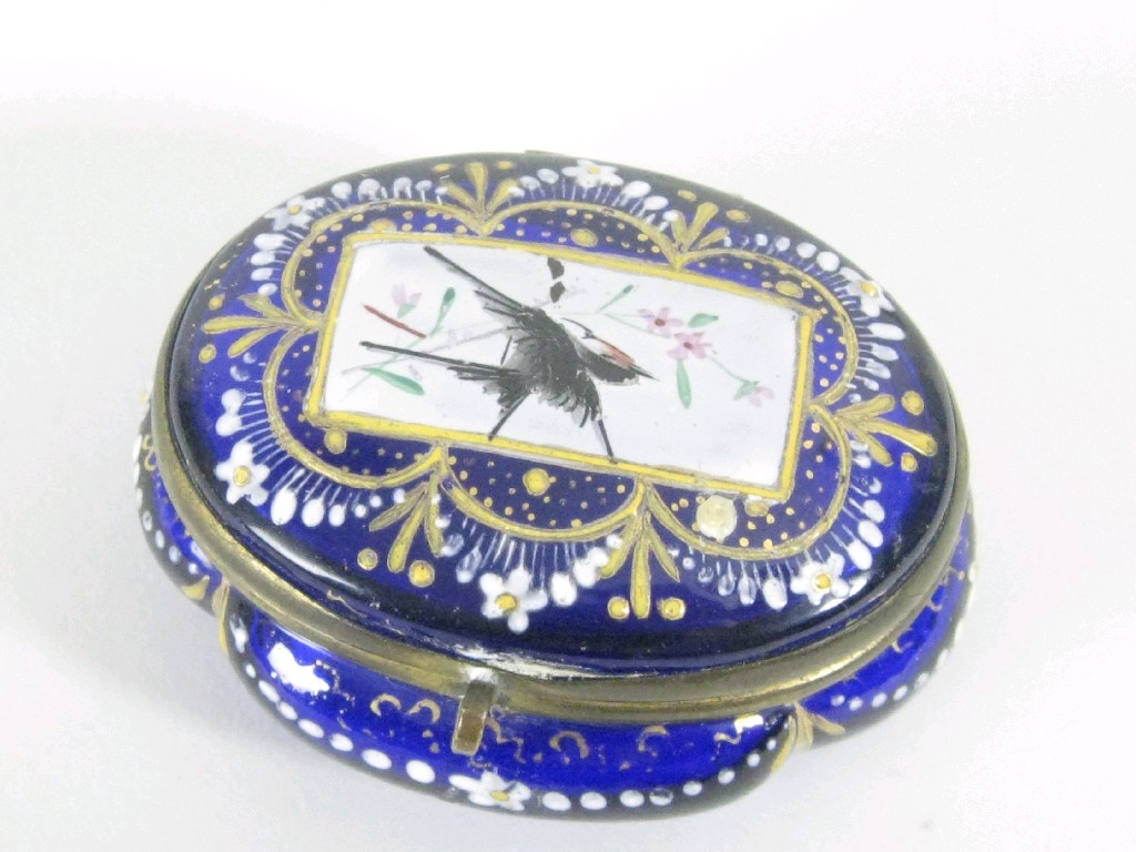 Appraisal: An oval glass hinged Box with enamel decoration of bird