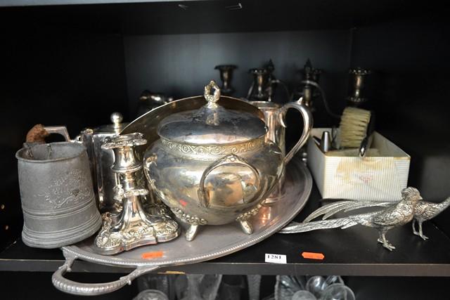 Appraisal: ONE SHELF OF SILVER PLATE INCL CRUETS CANDLESTICKS TRAY ETC