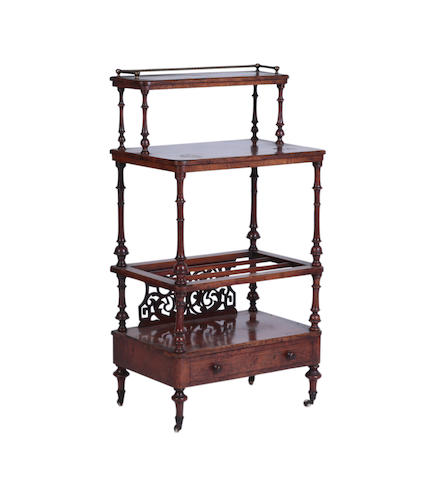 Appraisal: A Victorian figured-Walnut canterbury The rectangular top incorporating a raised