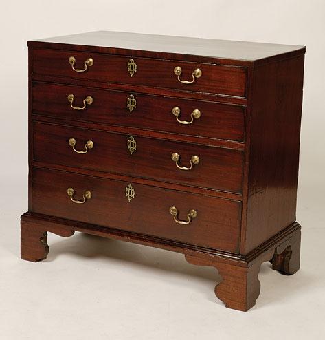 Appraisal: A GEORGE III MAHOGANY CHEST OF DRAWERS the rectangular top