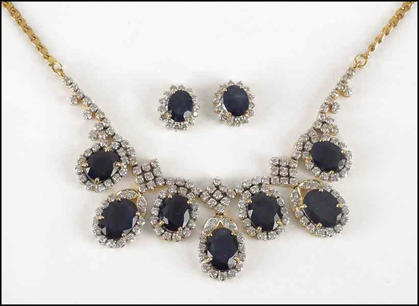 Appraisal: SAPPHIRE AND DIAMOND DEMI-PARURE Comprised of a pair of earrings