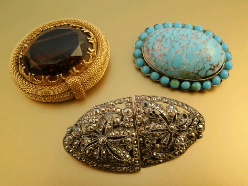 Appraisal: Two costume brooches and a metamorphic marcasite set dress clip