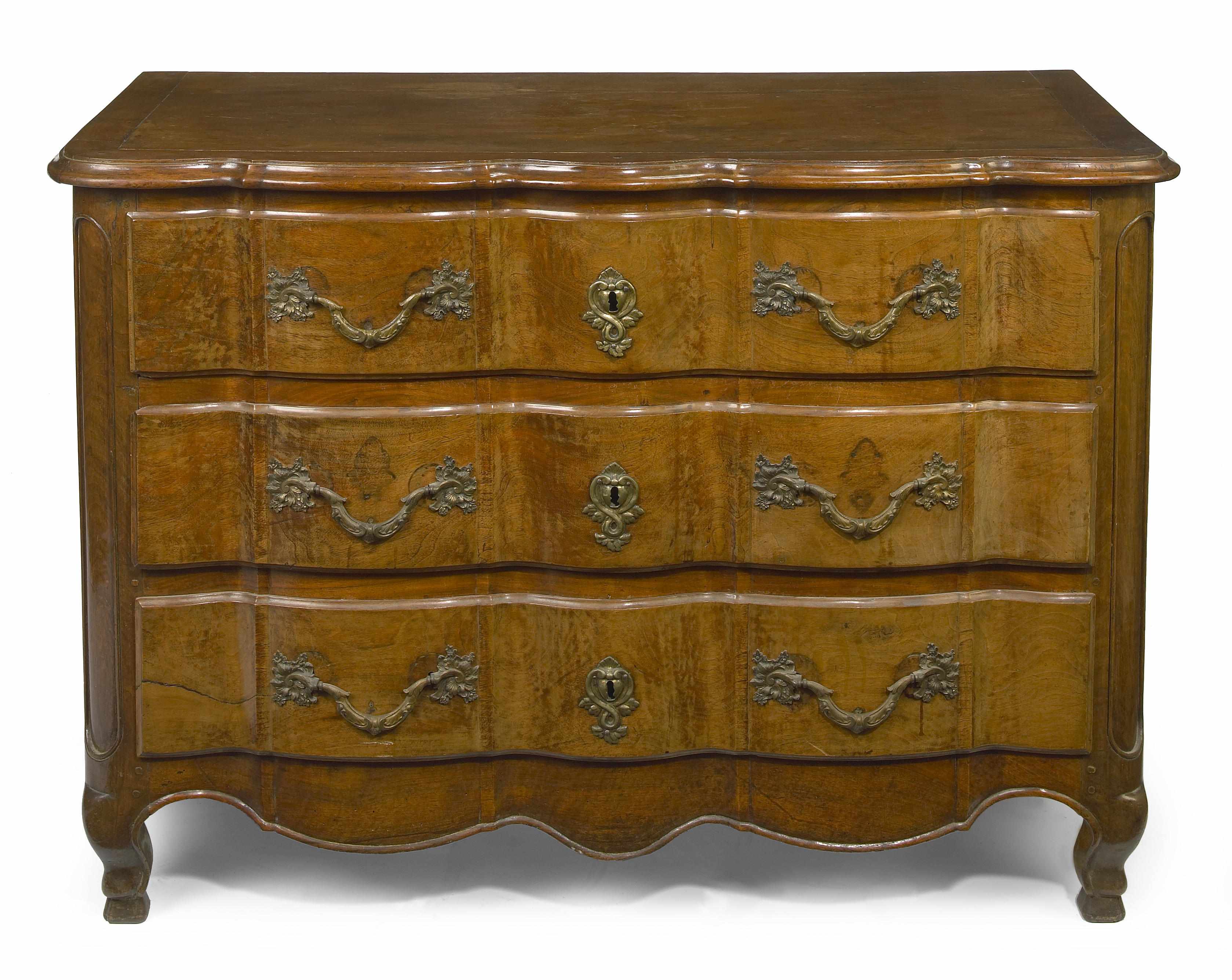 Appraisal: A Louis XV Provincial carved walnut commode mid th century