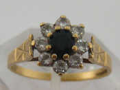 Appraisal: A carat yellow gold sapphire and white stone cluster ring