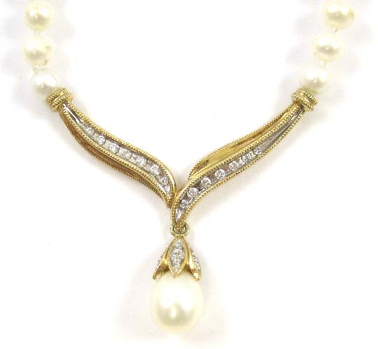 Appraisal: PEARL DIAMOND AND YELLOW GOLD NECKLACE inches in length the