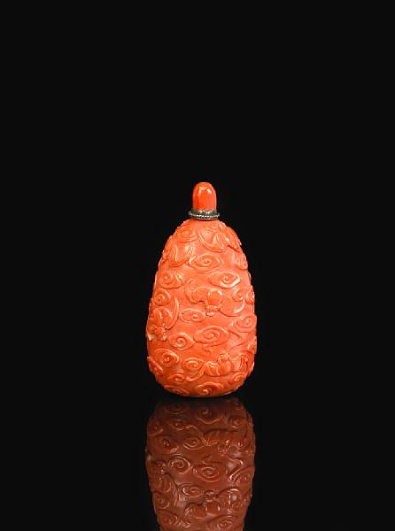 Appraisal: A coral snuff bottle th Century Of ovoid form with