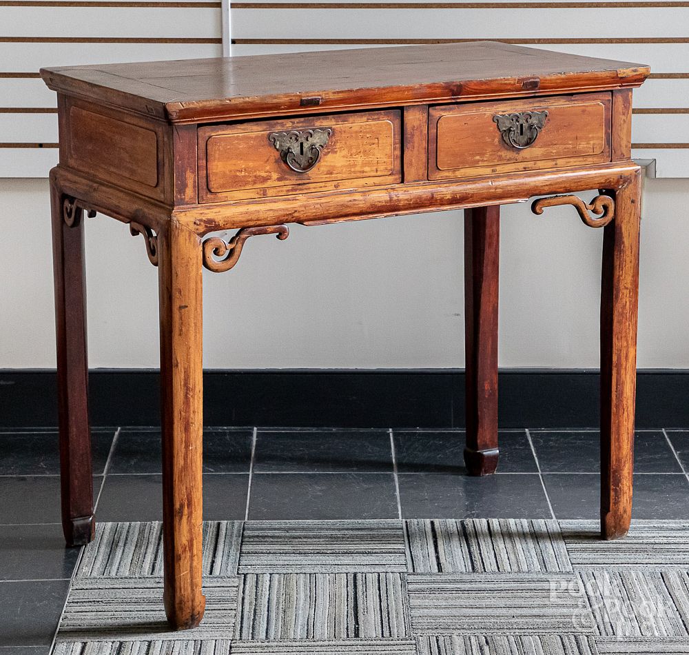 Appraisal: Chinese hardwood table with two drawers Chinese hardwood table with