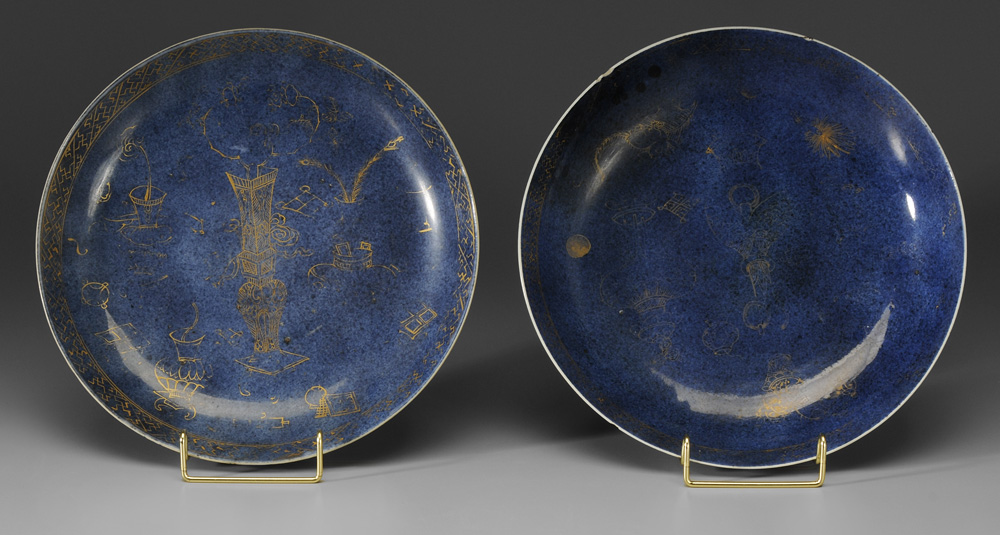 Appraisal: Two Similar Blue and Gilt- Decorated Shallow Bowls Chinese probably