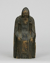 Appraisal: Antique Russian Priest Figure ca th Century A seated monk