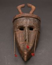 Appraisal: Marka Metal Covered Mask Early th Century This Marka metal