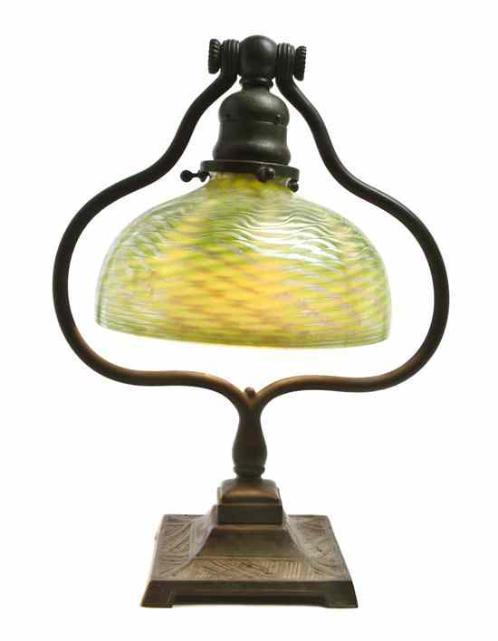 Appraisal: A Tiffany Studios Favrile Glass and Bronze Desk Lamp having