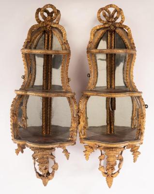 Appraisal: A pair of French gesso corner shelves mirror backed with