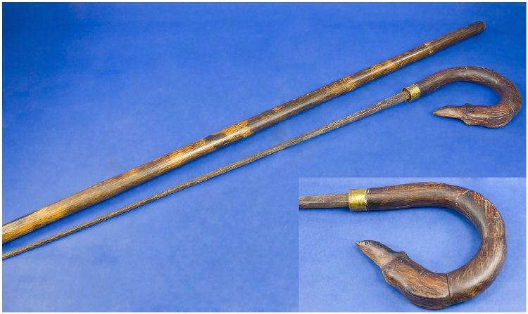 Appraisal: Sword Stick Wooden cane with handle in the form of