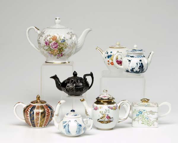 Appraisal: COLLECTION OF EIGHT TEAPOTS Including a Jackfield style th c