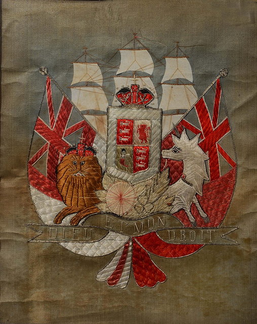 Appraisal: A TH CENTURY NEEDLEWORK ARMORIAL Dieu et Mondroit x cm