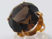 Appraisal: A yellow metal tests carat gold smokey quartz ring quartz