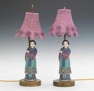 Appraisal: A Pair of Table Lamps with Glazed Porcelain Figures Brass