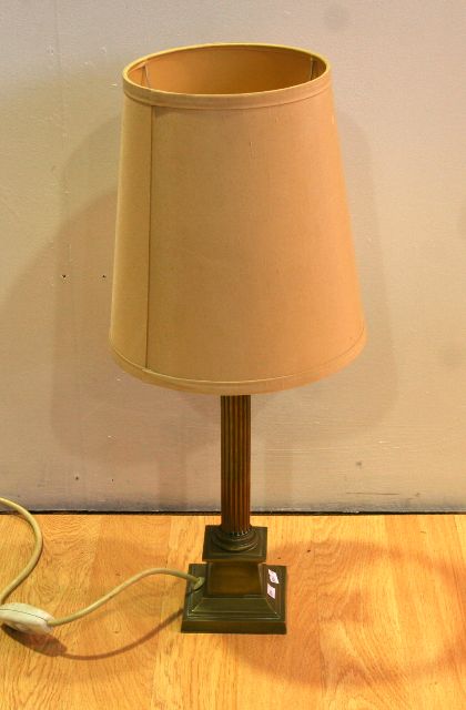 Appraisal: A Victorian brass lamp converted for electricity cm high without