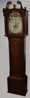 Appraisal: Grandfather clock arch broken top oak cased square base reeded