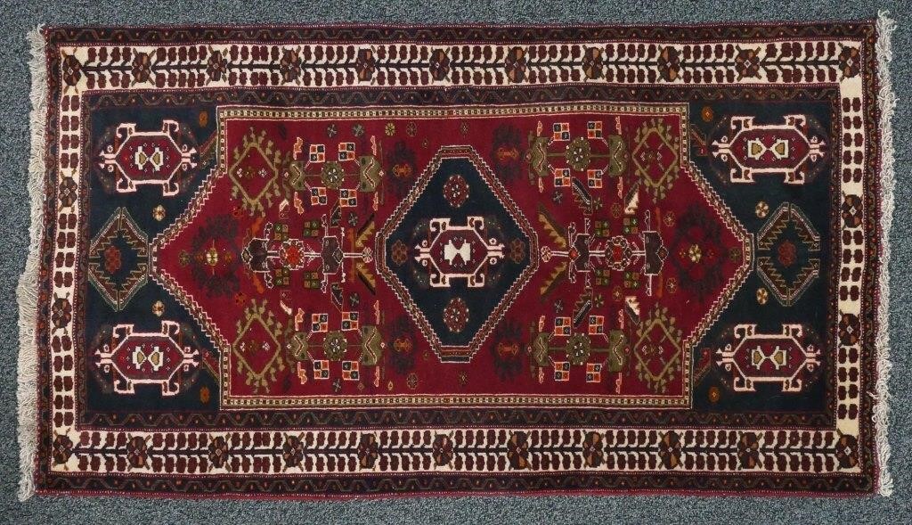 Appraisal: HAND KNOTTED KAZAK DESIGN RUGHand knotted Kazak tribal wool rug