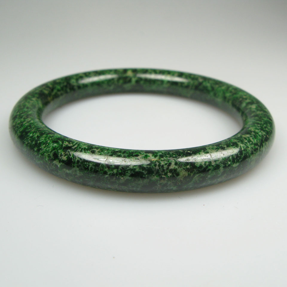 Appraisal: Dark Green Speckled Jade Bangle length in cm