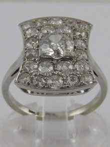 Appraisal: A white metal tests carat gold diamond cluster ring the