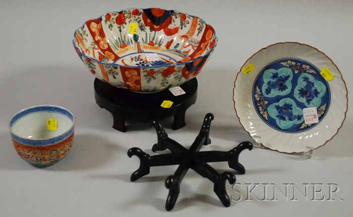 Appraisal: Three Asian Porcelain Bowls and a Hardwood Stand Imari bowl