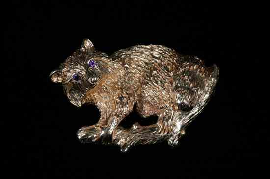 Appraisal: K YELLOW GOLD RACCOON FORM PIN Naturalistically sculpted textured raccoon