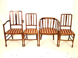 Appraisal: Four Edwardian mahogany and inlaid chairs comprising of two spar