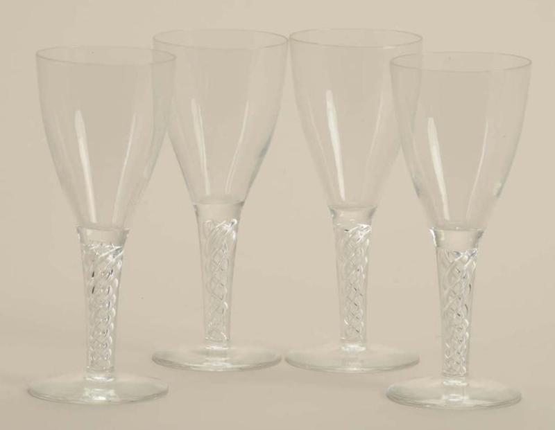 Appraisal: Lot of Colorless Glass Air Twist Wines Description Glassware Size